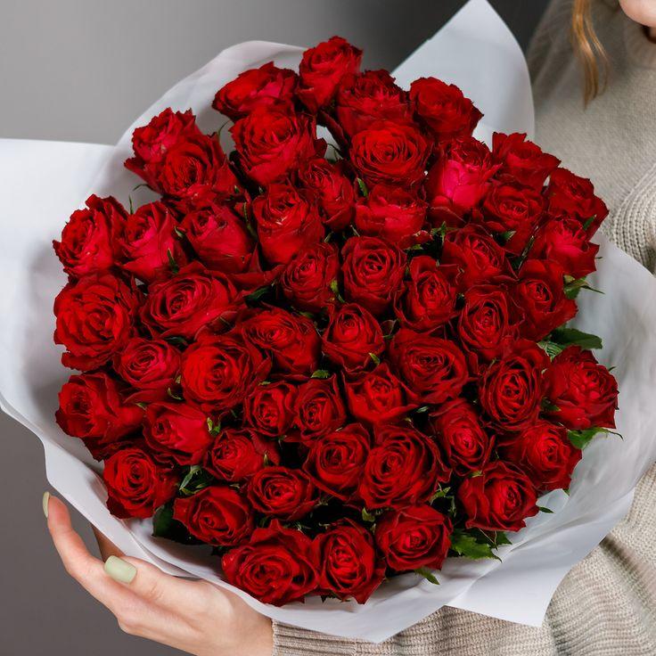 AncientKernelGentle workshop space where corporate flower arrangements are designed and prepared for business delivery